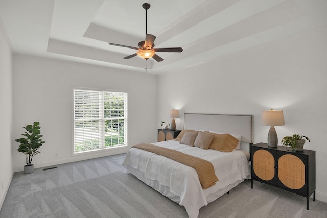 2785 Rutland Ct, Thompsons Station, TN 37179 - bedroom with carpet flooring, a raised ceiling, and a ceiling fan