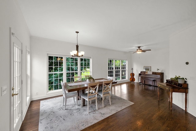 2785 Rutland Ct, Thompsons Station, TN 37179 - dining space featuring a chandelier, dark wood-style floors, and a ceiling fan