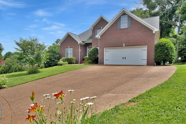 2785 Rutland Ct, Thompsons Station, TN 37179 - traditional home featuring concrete driveway, brick siding, a front lawn, and a garage