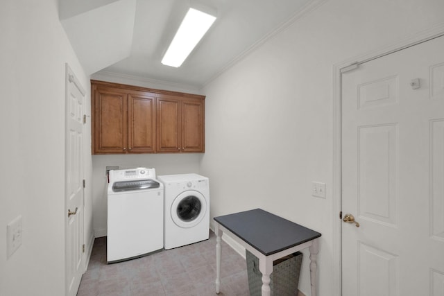 2785 Rutland Ct, Thompsons Station, TN 37179 - laundry room featuring cabinet space, washing machine and clothes dryer, and crown molding