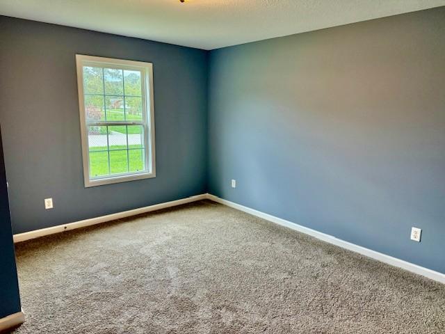 208 Broadrick St, Tullahoma, TN 37388 - carpeted spare room featuring baseboards