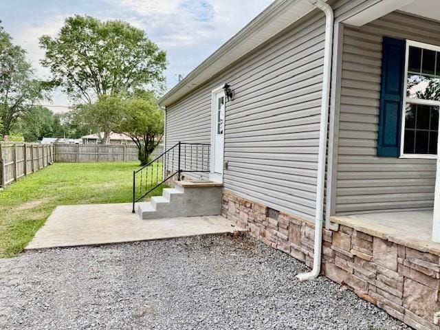 208 Broadrick St, Tullahoma, TN 37388 - view of home's exterior featuring a fenced backyard and a patio area
