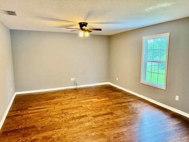 208 Broadrick St, Tullahoma, TN 37388 - unfurnished room with a ceiling fan and dark wood finished floors
