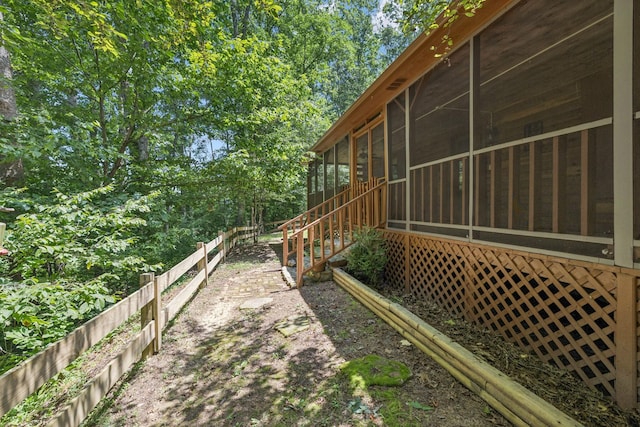 584 Mccord Hollow Rd, Hohenwald, TN 38462 - view of yard featuring a sunroom