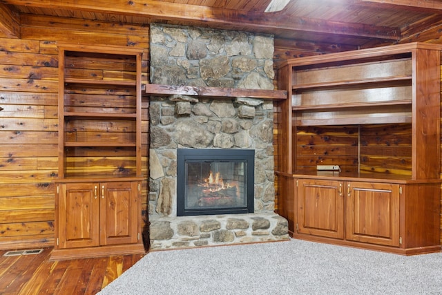 584 Mccord Hollow Rd, Hohenwald, TN 38462 - living room with a wood ceiling with exposed beams, a fireplace, and wood finished floors