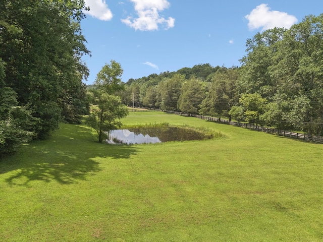 584 Mccord Hollow Rd, Hohenwald, TN 38462 - view of property's community featuring a wooded view and a water view