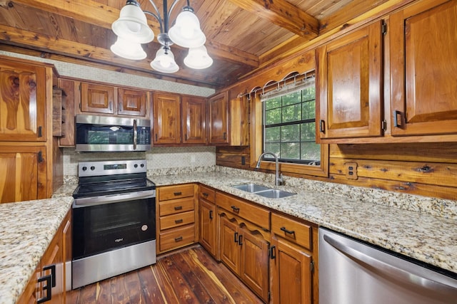 584 Mccord Hollow Rd, Hohenwald, TN 38462 - kitchen featuring stainless steel appliances, a wooden ceiling with exposed beams, dark wood finished floors, and brown cabinets