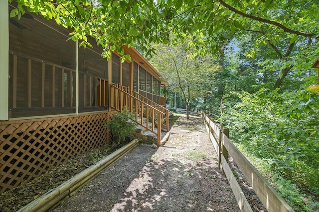 584 Mccord Hollow Rd, Hohenwald, TN 38462 - view of yard featuring a sunroom