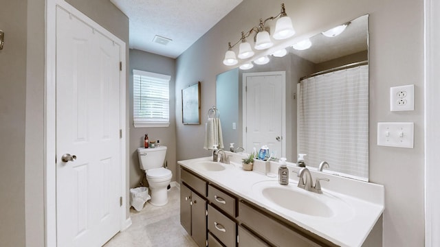 2806 Holsted Dr, Murfreesboro, TN 37128 - full bathroom with double vanity, a textured ceiling, and tile patterned flooring