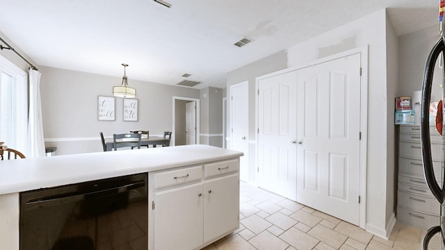 2806 Holsted Dr, Murfreesboro, TN 37128 - kitchen with black dishwasher, white cabinetry, light countertops, pendant lighting, and fridge