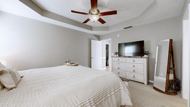 2806 Holsted Dr, Murfreesboro, TN 37128 - bedroom featuring light carpet, a tray ceiling, and a ceiling fan
