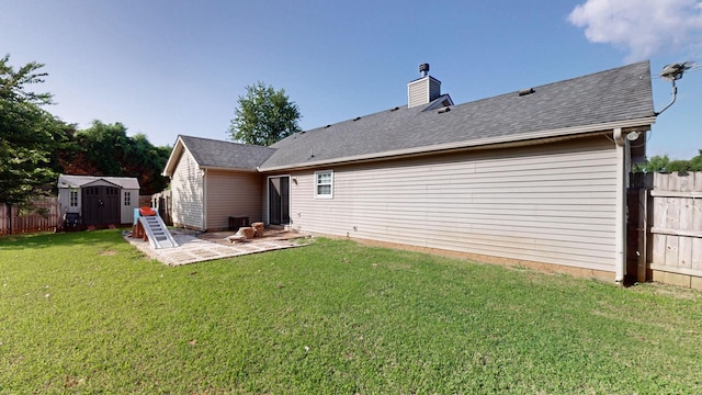 2806 Holsted Dr, Murfreesboro, TN 37128 - back of house featuring a patio area, a shed, a chimney, and a shingled roof