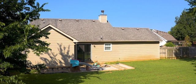 2806 Holsted Dr, Murfreesboro, TN 37128 - back of house featuring a chimney, roof with shingles, and a patio area