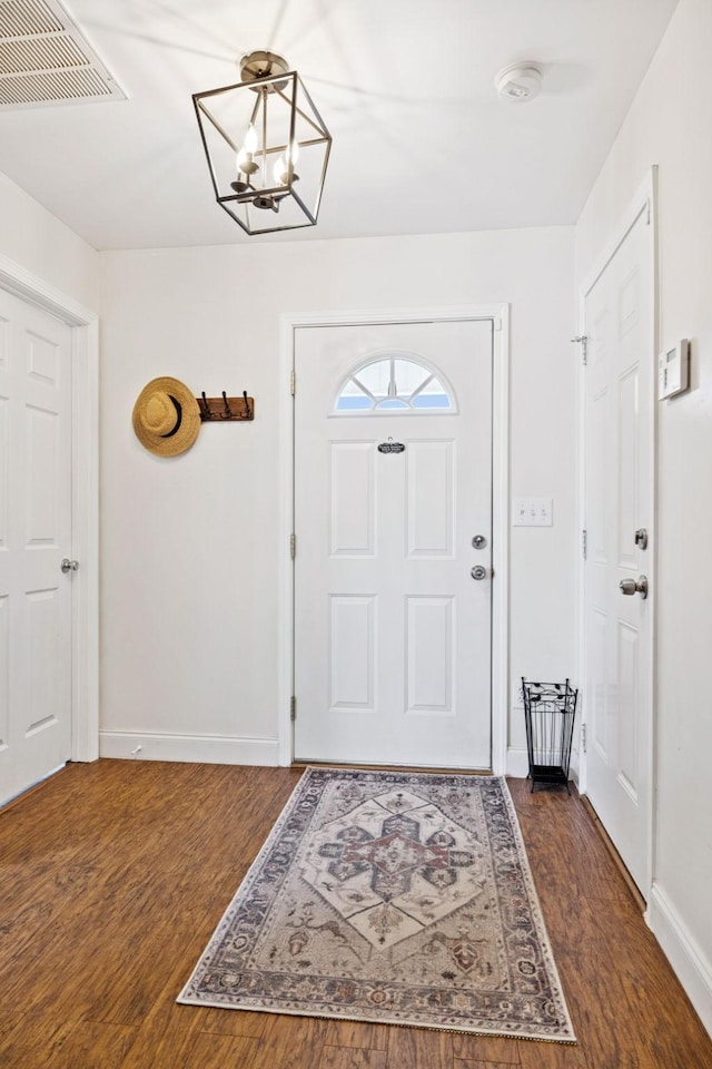 2016 Golden Ct, Spring Hill, TN 37174 - foyer with dark wood-type flooring and a chandelier