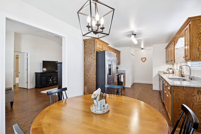 2016 Golden Ct, Spring Hill, TN 37174 - dining area with dark wood-style flooring and a chandelier