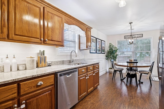 2016 Golden Ct, Spring Hill, TN 37174 - kitchen with dishwasher, brown cabinetry, and dark wood-type flooring