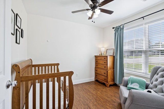 2016 Golden Ct, Spring Hill, TN 37174 - bedroom featuring wood finished floors, a crib, and a ceiling fan