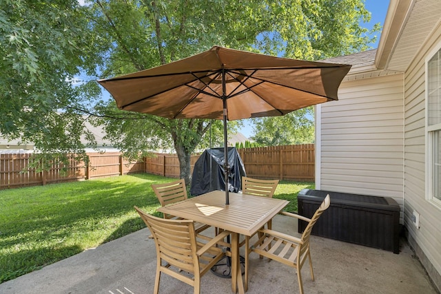 2016 Golden Ct, Spring Hill, TN 37174 - fenced backyard with a patio and outdoor dining space