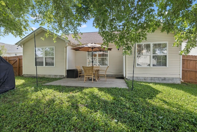 2016 Golden Ct, Spring Hill, TN 37174 - back of house with a fenced backyard and a patio area