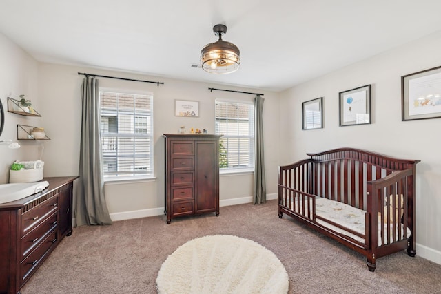 401 Birr Dr, Spring Hill, TN 37174 - bedroom featuring light colored carpet and a nursery area