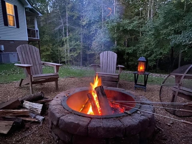 217 Red Oak Rd, Dover, TN 37058 - view of patio with an outdoor fire pit and a view of trees