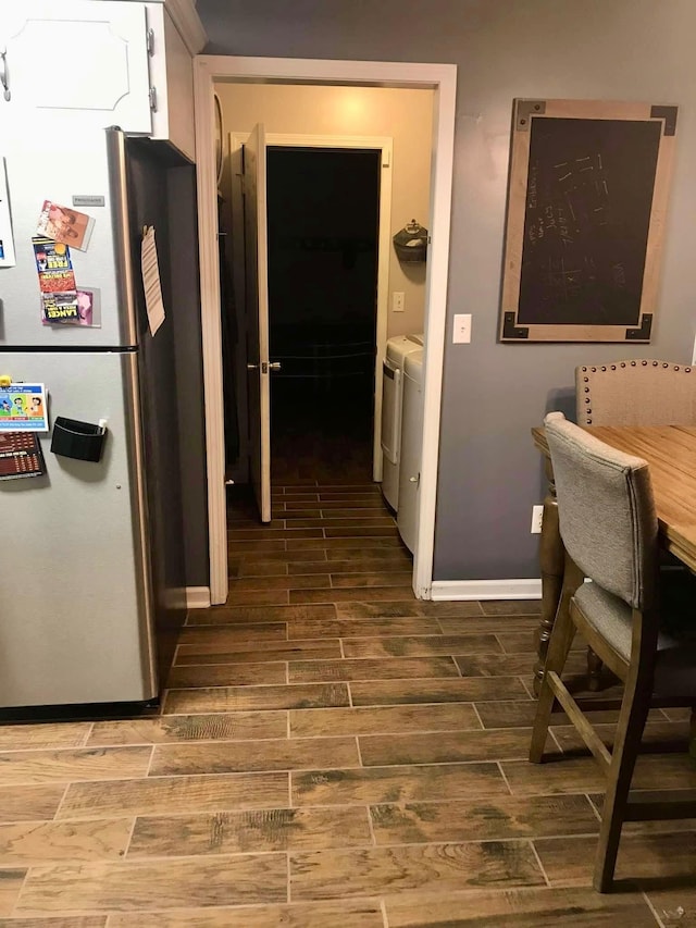 217 Red Oak Rd, Dover, TN 37058 - hall with separate washer and dryer and dark wood finished floors