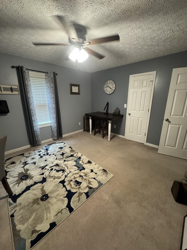 217 Red Oak Rd, Dover, TN 37058 - carpeted entrance foyer with ceiling fan and a textured ceiling