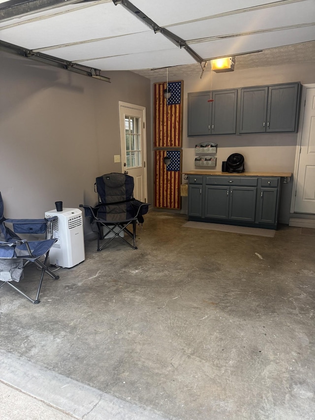 217 Red Oak Rd, Dover, TN 37058 - garage with a garage door opener