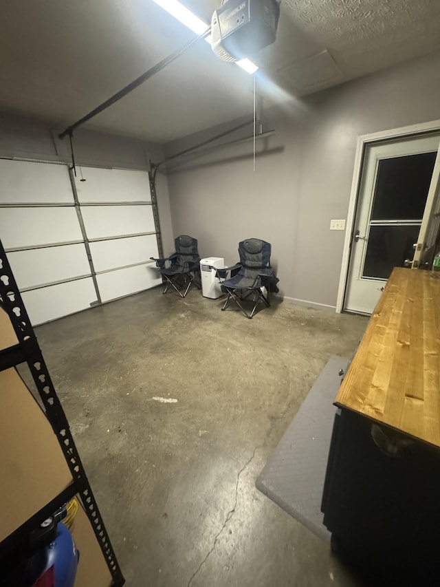 217 Red Oak Rd, Dover, TN 37058 - garage with a garage door opener
