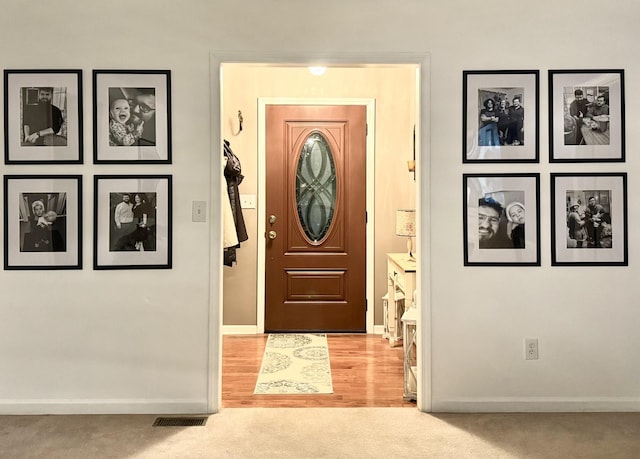 217 Red Oak Rd, Dover, TN 37058 - foyer entrance featuring baseboards and light colored carpet
