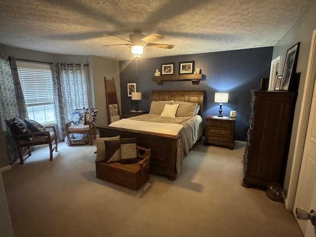 217 Red Oak Rd, Dover, TN 37058 - bedroom with light carpet, a textured ceiling, and a ceiling fan