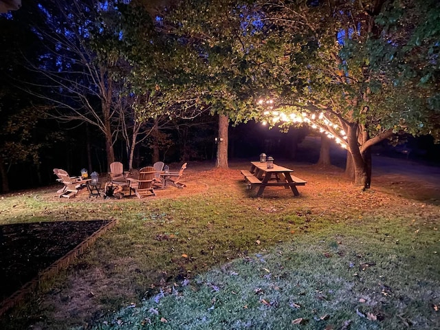 217 Red Oak Rd, Dover, TN 37058 - view of green lawn with a fire pit