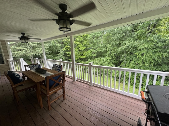 217 Red Oak Rd, Dover, TN 37058 - wooden terrace with ceiling fan and outdoor dining space