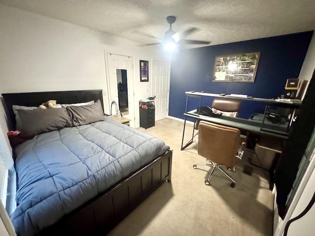 217 Red Oak Rd, Dover, TN 37058 - bedroom with carpet floors, an office area, a textured ceiling, and ceiling fan