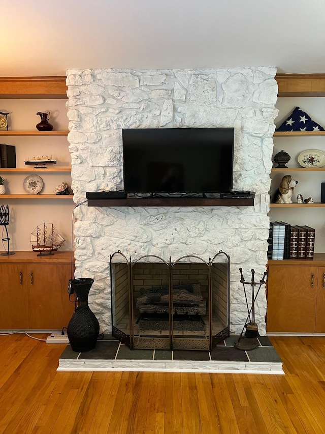 499 Pettus St, Lawrenceburg, TN 38464 - detailed view of a fireplace and wood finished floors