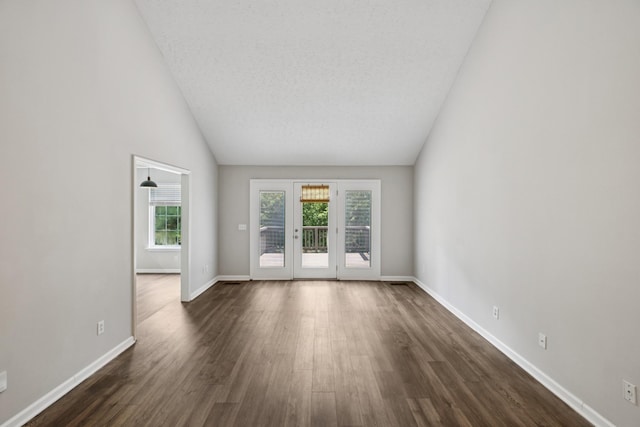 7616 Hudlow Ct, Fairview, TN 37062 - unfurnished living room with dark wood-type flooring and high vaulted ceiling