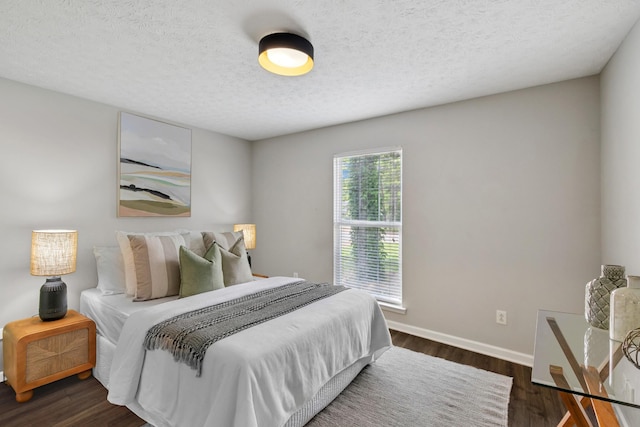 7616 Hudlow Ct, Fairview, TN 37062 - bedroom with dark wood-type flooring and a textured ceiling