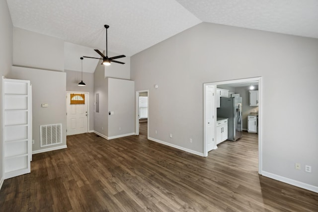 7616 Hudlow Ct, Fairview, TN 37062 - unfurnished living room with a ceiling fan, high vaulted ceiling, and dark wood-type flooring
