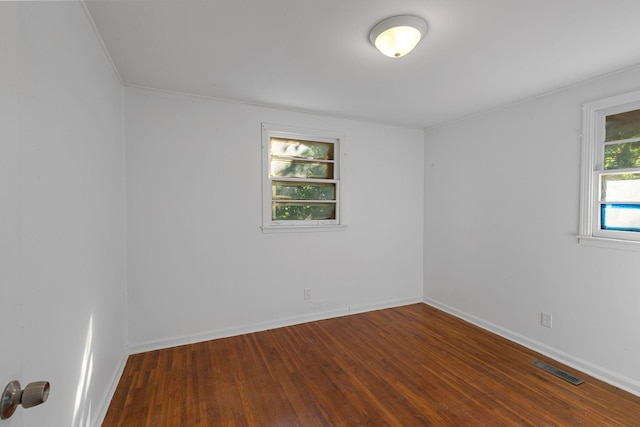 1401 Bearwallow Rd, Ashland City, TN 37015 - empty room with wood finished floors and baseboards