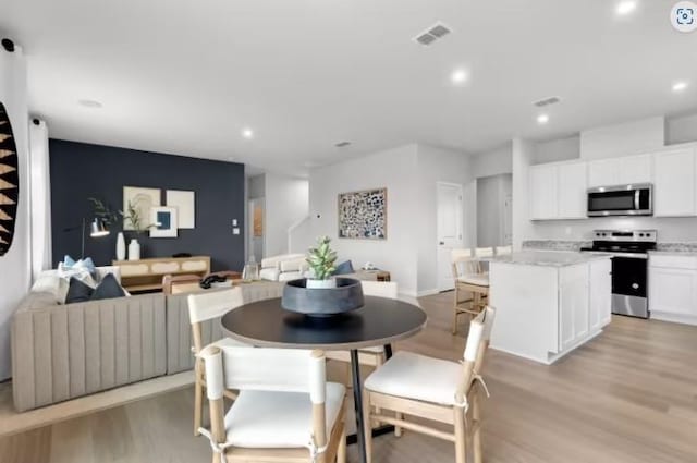 3294 Barrel Oak Pass, Columbia, TN 38401 - dining space featuring light wood finished floors and recessed lighting