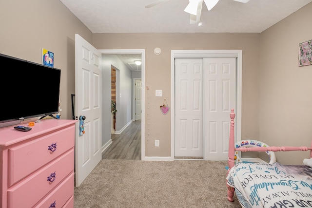 8100 Cedar Forrest Rd, Lascassas, TN 37085 - bedroom with light colored carpet, a closet, and a ceiling fan