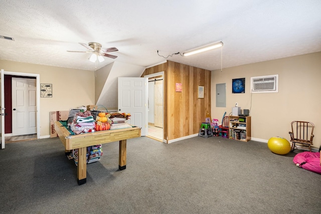 8100 Cedar Forrest Rd, Lascassas, TN 37085 - recreation room featuring a wall mounted air conditioner, electric panel, ceiling fan, carpet, and wood walls