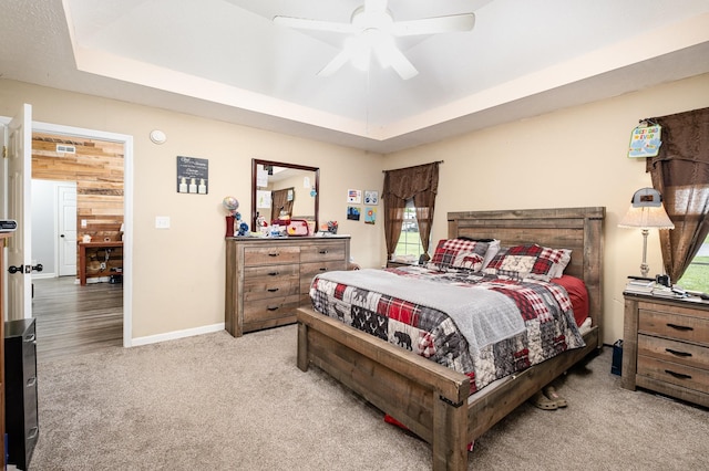 8100 Cedar Forrest Rd, Lascassas, TN 37085 - bedroom with carpet flooring, a tray ceiling, and a ceiling fan