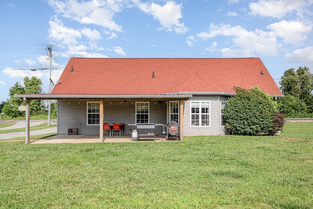 8100 Cedar Forrest Rd, Lascassas, TN 37085 - rear view of property featuring a lawn, a patio, and an attached carport