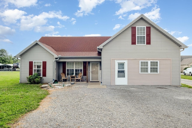 8100 Cedar Forrest Rd, Lascassas, TN 37085 - view of front facade with covered porch, a front lawn, and gravel driveway
