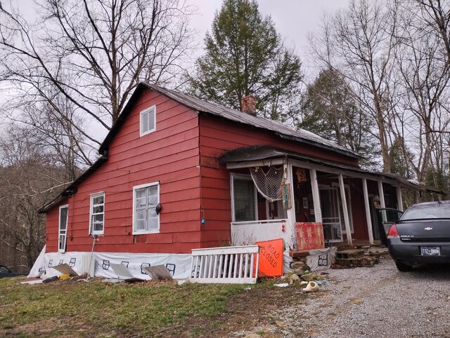 105 Big Laurel Creek Rd, Crawford, TN 38554 - view of front of property with a chimney and a sunroom