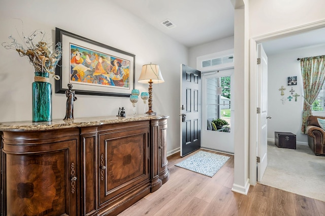 155 Nunally Dr, Baxter, TN 38544 - foyer entrance featuring light wood finished floors and baseboards