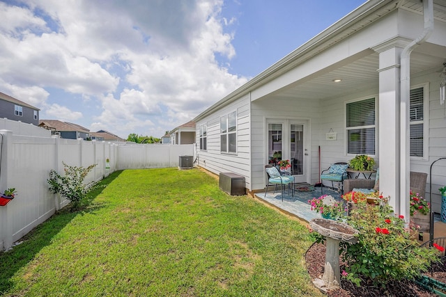 155 Nunally Dr, Baxter, TN 38544 - fenced backyard with a patio area