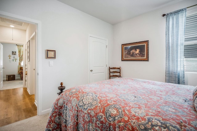 155 Nunally Dr, Baxter, TN 38544 - carpeted bedroom featuring baseboards and wood finished floors