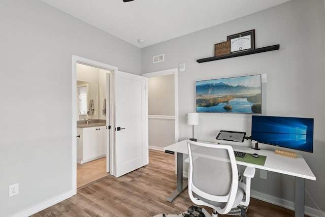 2006 Edison Park Ln, Nashville, TN 37209 - home office with wood finished floors and baseboards